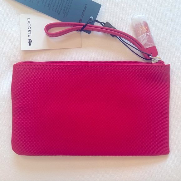 Lacoste Bright Pink Wristlet Clutch NWT 8.25”L x 5”’W - Picture 2 of 4